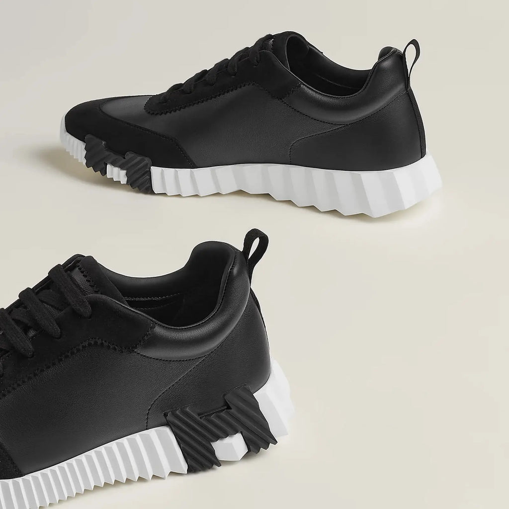 Hermes Bouncing Sneaker schwarz Herren Rückansicht mit schwarzem H und weißer Plateausohle