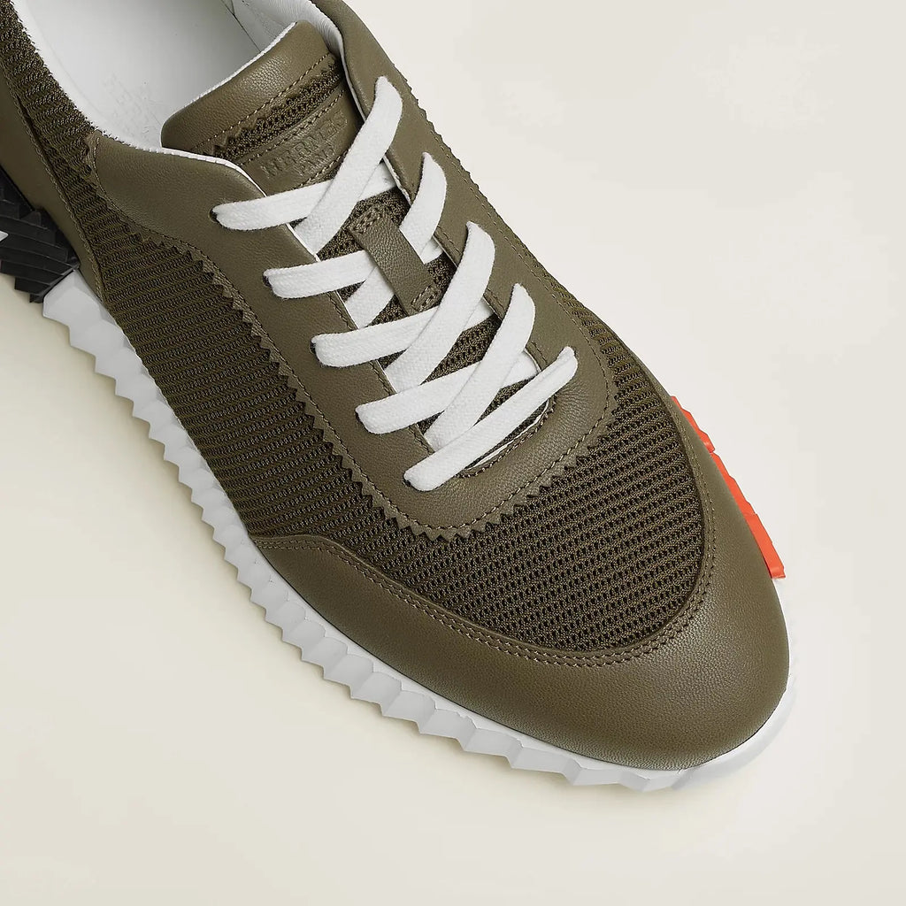 Hermes Bouncing Sneaker Herren khakigrün – Detailansicht weiße gerippte Gummisohle